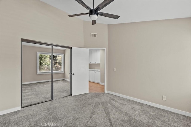 26337 Rainbow Glen Dr Unit 244, Newhall, CA 91321 - unfurnished bedroom with carpet flooring, a high ceiling, a closet, and ceiling fan