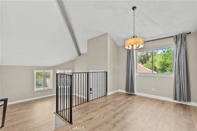 26337 Rainbow Glen Dr Unit 244, Newhall, CA 91321 - unfurnished room with a chandelier and wood finished floors