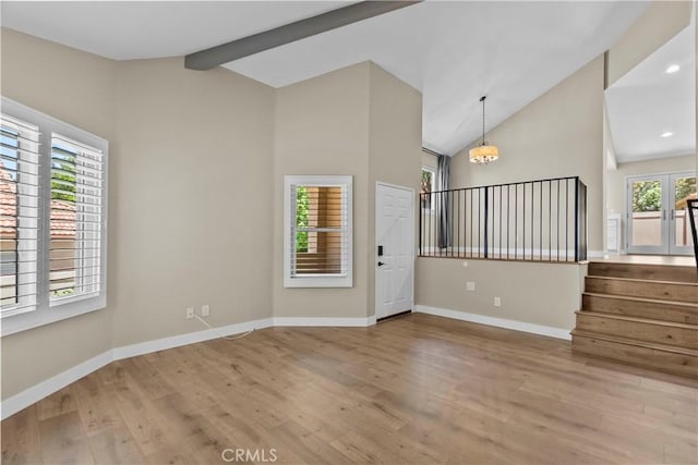 26337 Rainbow Glen Dr Unit 244, Newhall, CA 91321 - foyer with wood finished floors, stairway, beamed ceiling, high vaulted ceiling, and recessed lighting