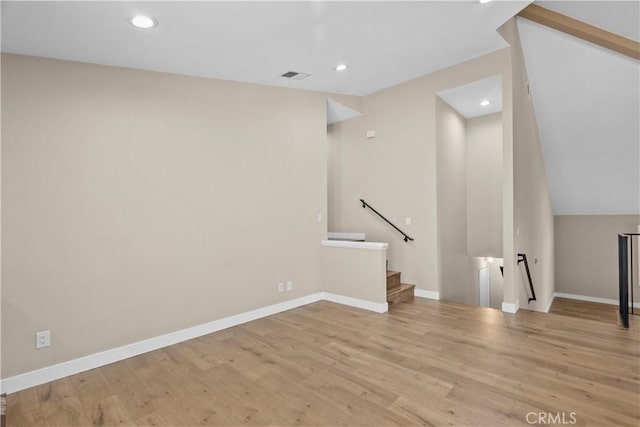 26337 Rainbow Glen Dr Unit 244, Newhall, CA 91321 - unfurnished living room featuring wood finished floors and recessed lighting
