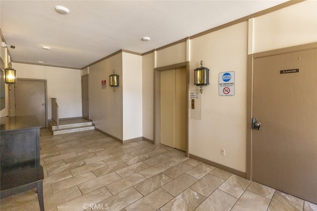 1118 N Central Ave Unit 14, Glendale, CA 91202 - corridor with elevator and baseboards
