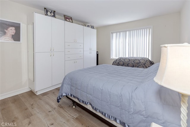 1118 N Central Ave Unit 14, Glendale, CA 91202 - bedroom with light wood-style flooring and baseboards
