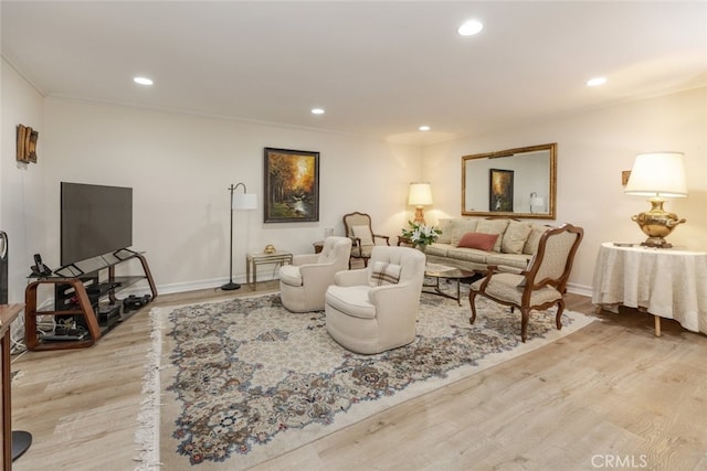 1118 N Central Ave Unit 14, Glendale, CA 91202 - living area featuring light wood finished floors, recessed lighting, and crown molding