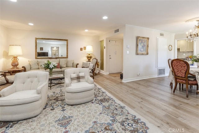 1118 N Central Ave Unit 14, Glendale, CA 91202 - living room with a chandelier, light wood-type flooring, recessed lighting, and ornamental molding