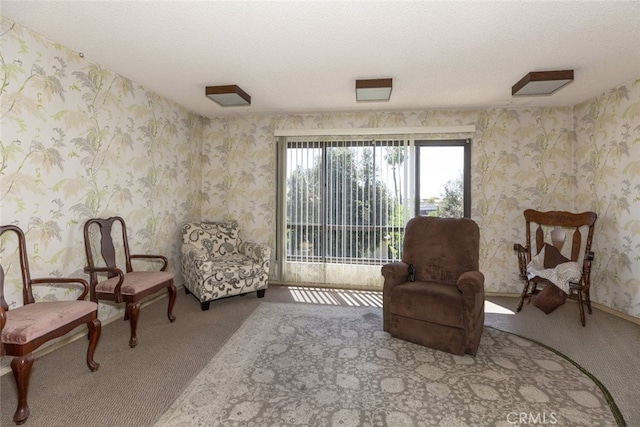 1118 N Central Ave Unit 14, Glendale, CA 91202 - living area with carpet flooring, wallpapered walls, and a textured ceiling