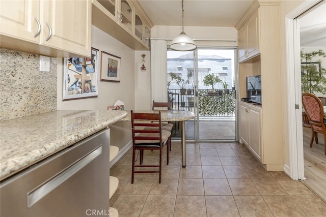 1118 N Central Ave Unit 14, Glendale, CA 91202 - dining room with plenty of natural light and light tile patterned floors