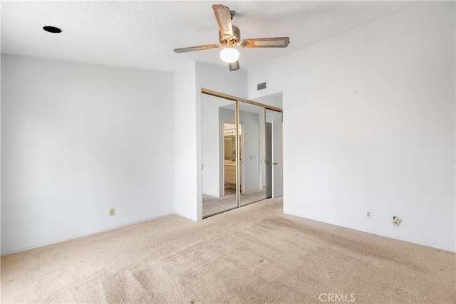 810 E Laurel Oak Dr, Azusa, CA 91702 - unfurnished bedroom featuring light colored carpet, a closet, and a ceiling fan