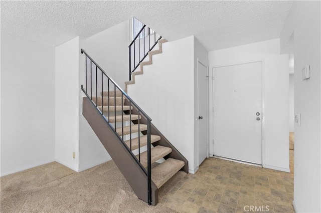 810 E Laurel Oak Dr, Azusa, CA 91702 - stairway featuring a textured ceiling and baseboards