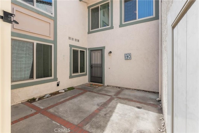 810 E Laurel Oak Dr, Azusa, CA 91702 - view of exterior entry featuring stucco siding and a patio area