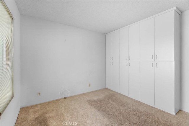810 E Laurel Oak Dr, Azusa, CA 91702 - unfurnished bedroom with light colored carpet and a closet