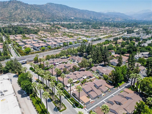 810 E Laurel Oak Dr, Azusa, CA 91702 - aerial overview of property's location featuring a mountain backdrop and nearby suburban area