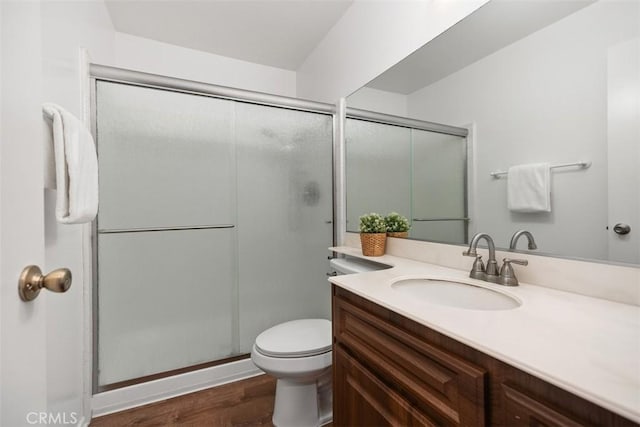 10 Starfall Unit 11, Irvine, CA 92603 - full bathroom featuring wood finished floors, vanity, and a shower stall