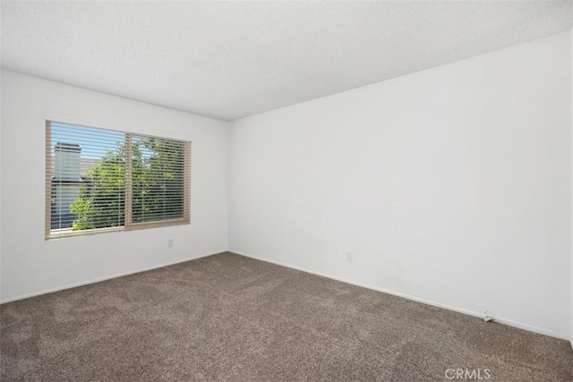 10 Starfall Unit 11, Irvine, CA 92603 - carpeted empty room with baseboards