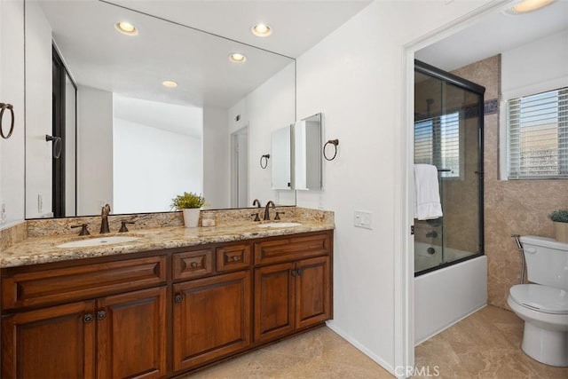 10 Starfall Unit 11, Irvine, CA 92603 - bathroom with double vanity, shower / bath combination with glass door, and recessed lighting
