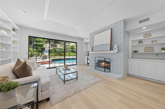 21 Santa Catalina Dr, Rancho Palos Verdes, CA 90275 - living area with a fireplace and light wood-type flooring