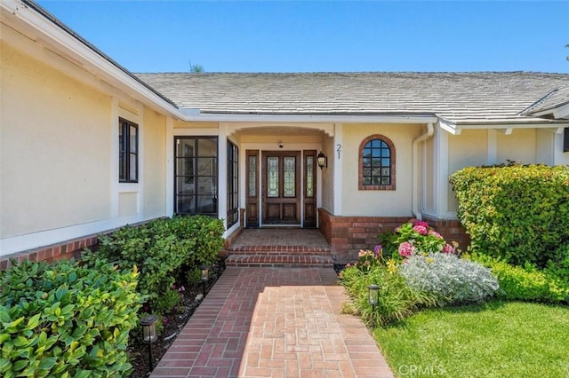 21 Santa Catalina Dr, Rancho Palos Verdes, CA 90275 - doorway to property with stucco siding, roof with shingles, and brick siding