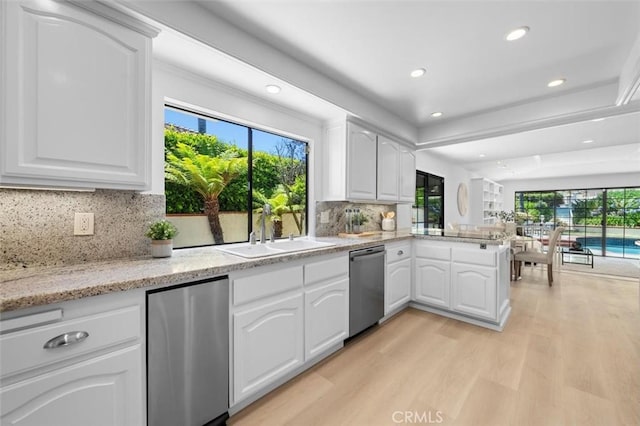 21 Santa Catalina Dr, Rancho Palos Verdes, CA 90275 - kitchen featuring stainless steel dishwasher, recessed lighting, a peninsula, light wood-style floors, and healthy amount of natural light