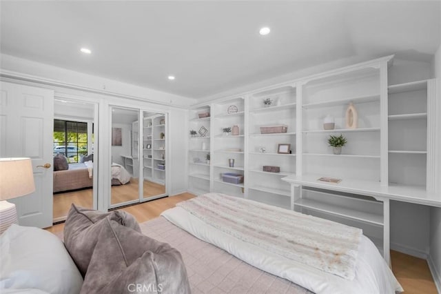 21 Santa Catalina Dr, Rancho Palos Verdes, CA 90275 - bedroom featuring wood finished floors, multiple closets, and recessed lighting