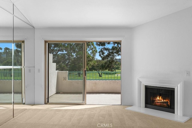 232 Villa Point Dr, Newport Beach, CA 92660 - unfurnished living room with carpet floors and a lit fireplace