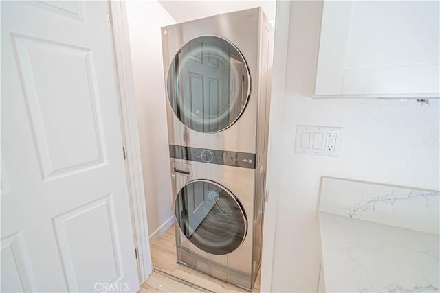 35356 Sierra Vista Dr, Agua Dulce, CA 91390 - laundry room featuring stacked washer / dryer and light wood-style flooring
