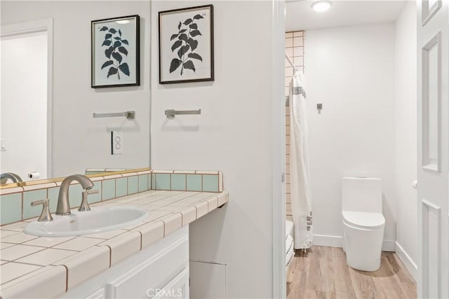 35356 Sierra Vista Dr, Agua Dulce, CA 91390 - full bathroom with vanity, wood finished floors, and shower / tub combo