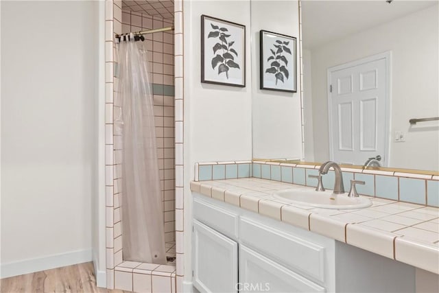 35356 Sierra Vista Dr, Agua Dulce, CA 91390 - bathroom featuring vanity, a shower stall, and wood finished floors