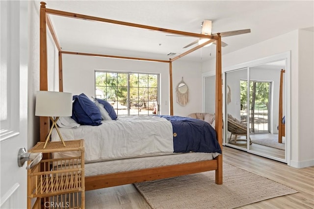 35356 Sierra Vista Dr, Agua Dulce, CA 91390 - bedroom featuring access to outside, multiple windows, wood finished floors, and ceiling fan