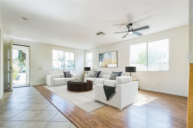 1030 Benedict Cir, Corona, CA 92882 - living room with ceiling fan and light wood finished floors
