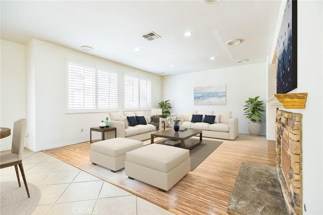 1030 Benedict Cir, Corona, CA 92882 - living room featuring recessed lighting and light tile patterned floors