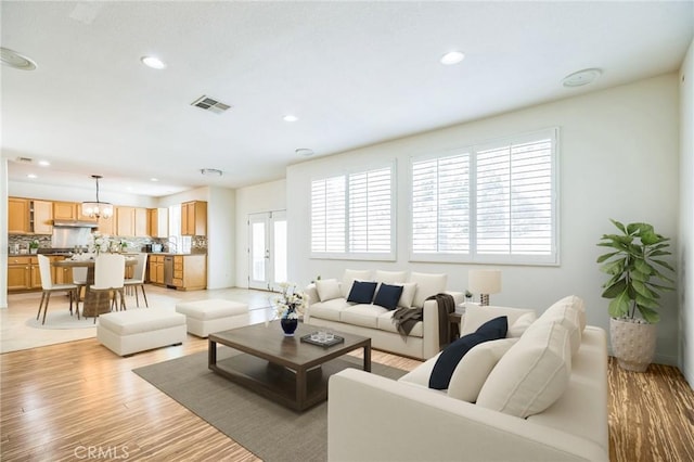 1030 Benedict Cir, Corona, CA 92882 - living room featuring recessed lighting and light wood-style floors