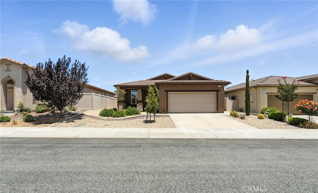 1616 Rosemary, Beaumont, CA 92223 - single story home with stucco siding, a garage, concrete driveway, and a tiled roof