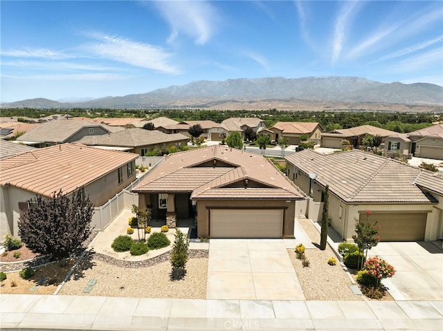 1616 Rosemary, Beaumont, CA 92223 - view of front facade with a residential view, concrete driveway, stucco siding, and an attached garage