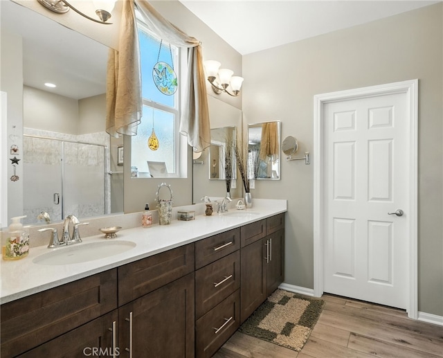1616 Rosemary, Beaumont, CA 92223 - full bathroom featuring double vanity, a shower stall, and wood finished floors