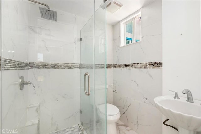 6681 Rostrata Ave, Buena Park, CA 90621 - full bath featuring a marble finish shower, marble finish flooring, and tile walls