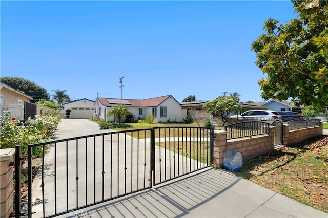 6681 Rostrata Ave, Buena Park, CA 90621 - view of front of home featuring a fenced front yard, a residential view, a gate, and solar panels