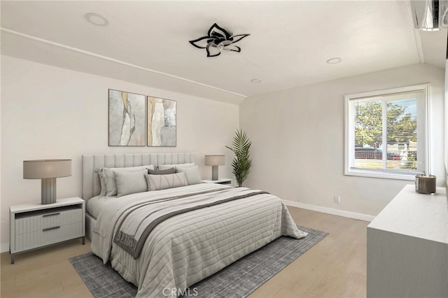6681 Rostrata Ave, Buena Park, CA 90621 - bedroom featuring vaulted ceiling and light wood finished floors