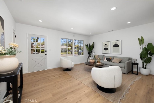 2231 Ocana Ave, Long Beach, CA 90815 - living area featuring light wood-style floors and recessed lighting