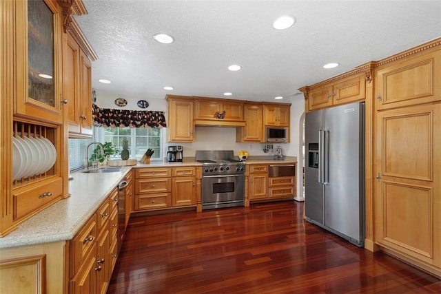 2531 Wildcat Ln, Riverside, CA 92503 - kitchen featuring high quality appliances, recessed lighting, dark wood-type flooring, glass insert cabinets, and custom exhaust hood