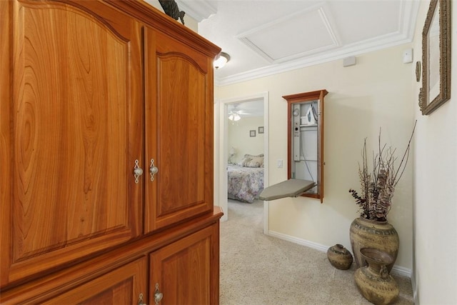 2531 Wildcat Ln, Riverside, CA 92503 - corridor with carpet, attic access, and crown molding