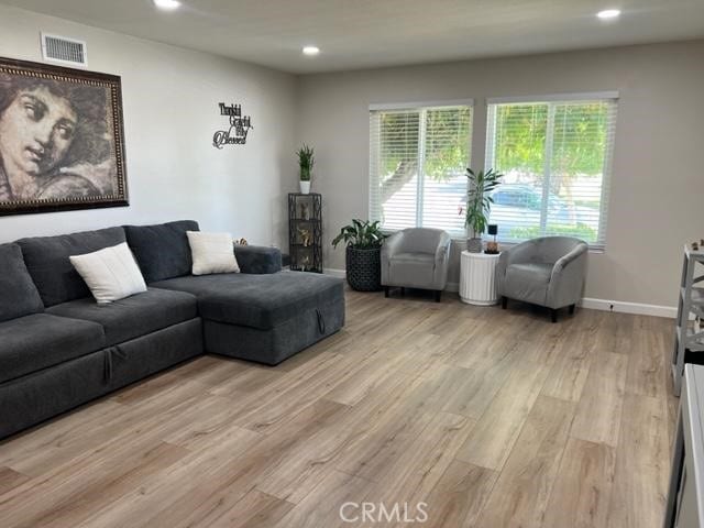 9827 Estacia Ct, Rancho Cucamonga, CA 91730 - living room with recessed lighting and light wood-style floors