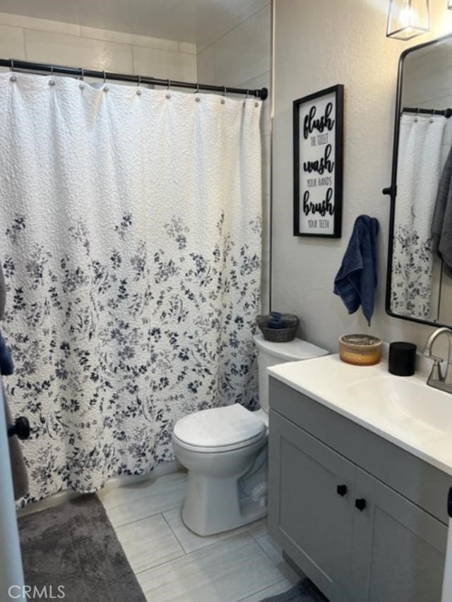 9827 Estacia Ct, Rancho Cucamonga, CA 91730 - full bathroom with vanity, a shower with curtain, and tile patterned floors