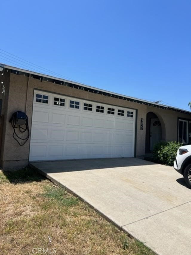 9827 Estacia Ct, Rancho Cucamonga, CA 91730 - view of front of property featuring stucco siding and a garage