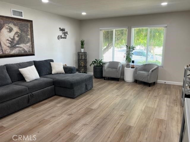 9827 Estacia Ct, Rancho Cucamonga, CA 91730 - living room with light wood-type flooring and recessed lighting