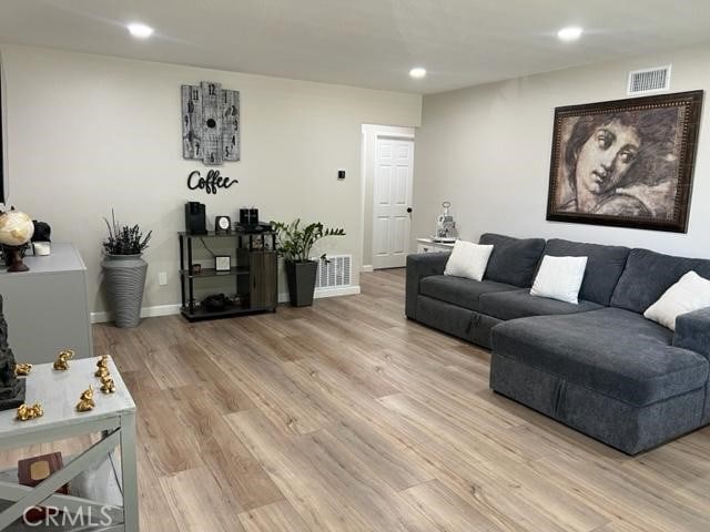 9827 Estacia Ct, Rancho Cucamonga, CA 91730 - living area with light wood-type flooring and recessed lighting
