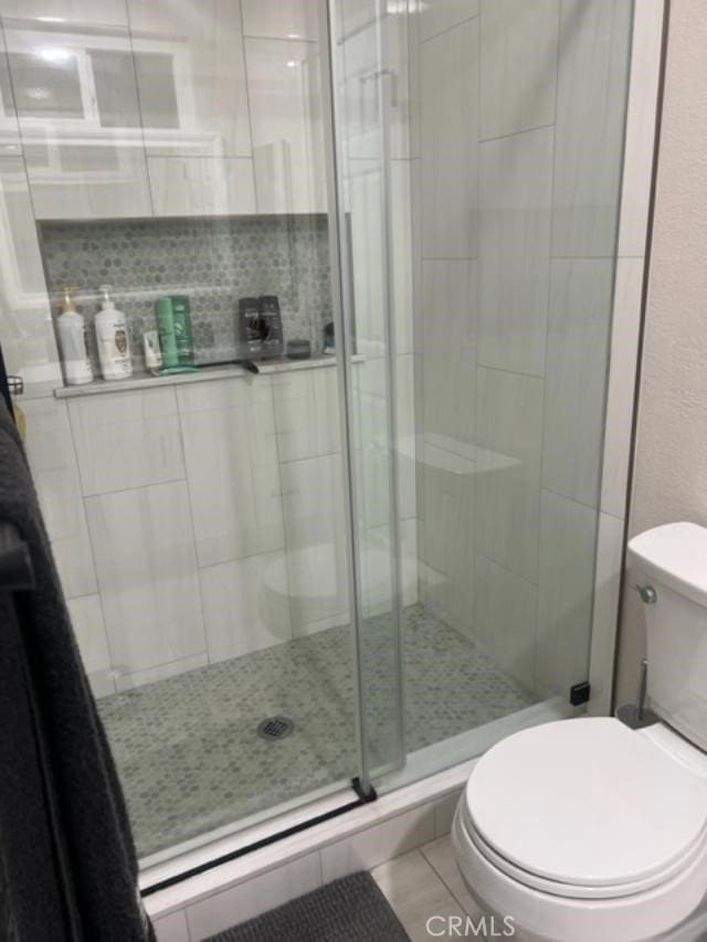 9827 Estacia Ct, Rancho Cucamonga, CA 91730 - full bathroom featuring toilet and a stall shower