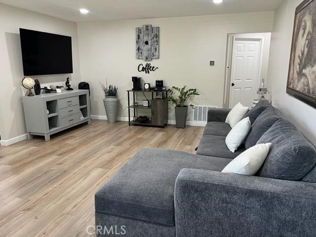 9827 Estacia Ct, Rancho Cucamonga, CA 91730 - living area featuring light wood-style floors and recessed lighting
