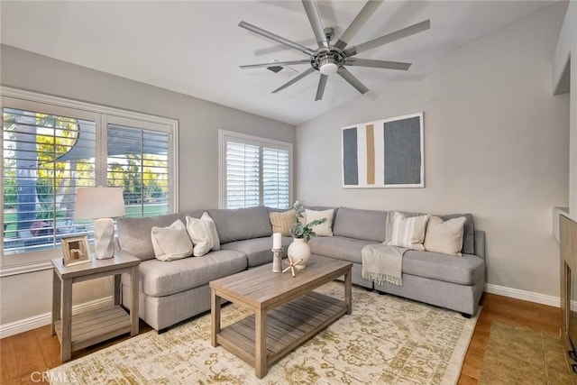 591 Shadow Tree Dr, Oceanside, CA 92058 - living room with wood finished floors, lofted ceiling, and a ceiling fan