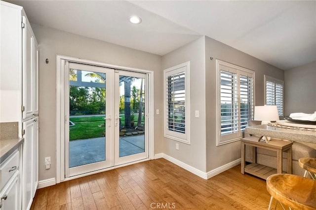 591 Shadow Tree Dr, Oceanside, CA 92058 - entryway featuring light wood-style floors, healthy amount of natural light, and recessed lighting