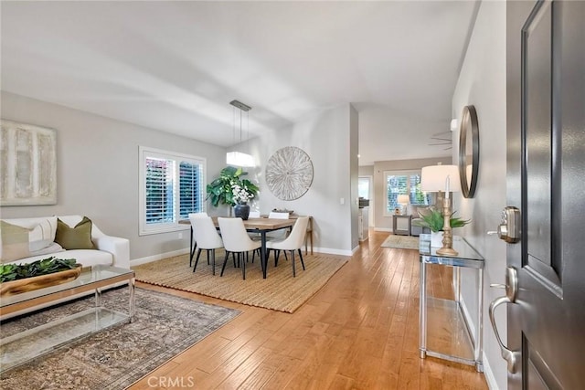 591 Shadow Tree Dr, Oceanside, CA 92058 - dining space with light wood finished floors and baseboards