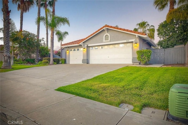 591 Shadow Tree Dr, Oceanside, CA 92058 - view of front of property featuring a garage, stucco siding, concrete driveway, and a tile roof